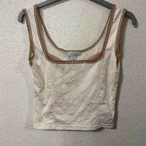 Hennes Camisole top
Color: Cream with flower designs
Size: Medium